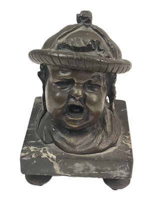 Lot 42 - A French bronzed brass inkwell in the form of...