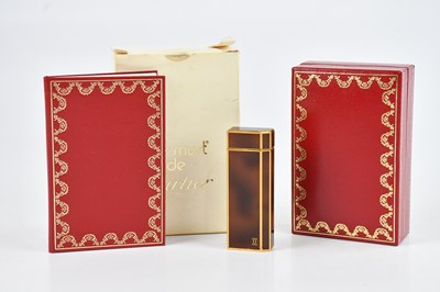 Lot 1200 - LE MUST DE CARTIER; a simulated tortoiseshell...