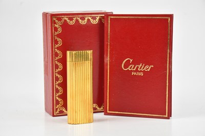 Lot 1196 - LE MUST DE CARTIER; a gold plated cigarette...