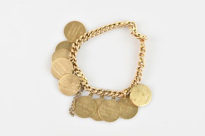 Lot 88 - A yellow metal curb link bracelet set with...