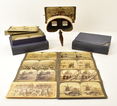 Lot 404 - A vintage stereoscope with adjustable slide...