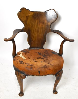 Lot 1559 - A 19th century walnut open arm elbow chair
