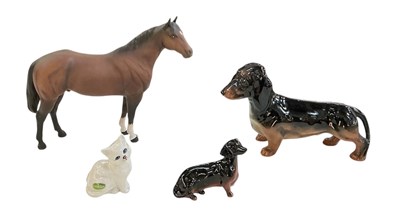 Lot 619 - BESWICK; a porcelain figure of a horse,...
