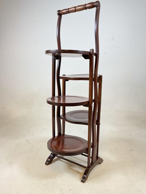 Lot 562 - An Edwardian five tier wooden cake stand