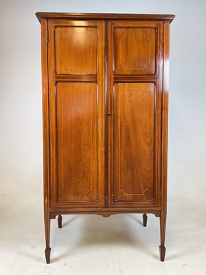 Lot 711 - An Edwardian mahogany and string inlaid music...