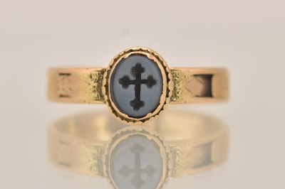 Lot 1412 - A 15ct yellow gold religious intaglio ring...