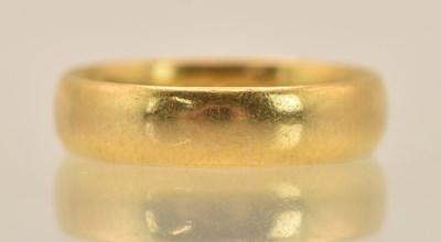 Lot 1341 - A 22ct yellow gold band ring, size K, approx 3....