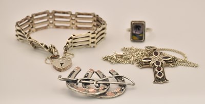 Lot 1552 - Four items of silver jewellery including a...