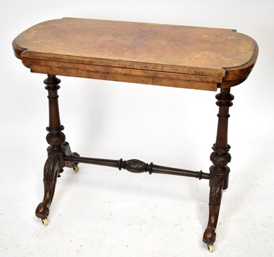 Lot 1611 - A Victorian walnut and inlaid card table