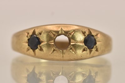 Lot 1388 - A 9ct yellow gold ring set with two star set...