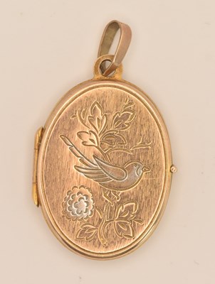 Lot 1469 - A 9ct yellow gold oval double locket, height 2....