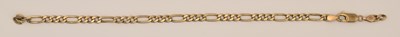 Lot 1529 - A 9ct yellow gold figaro link bracelet with...
