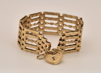 Lot 1516 - A 9ct yellow gold five bar gate link bracelet...