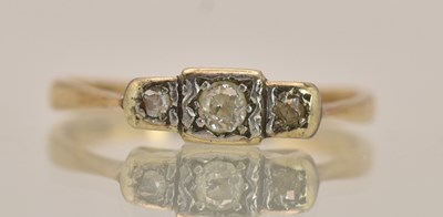 Lot 1419 - A 9ct yellow gold and platinum ring set with...