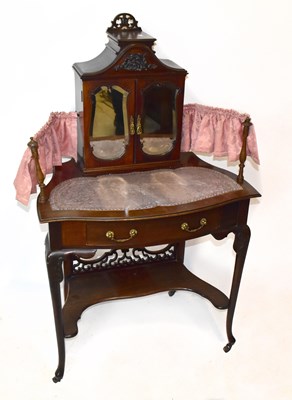 Lot 1612 - An Edwardian mahogany writing table