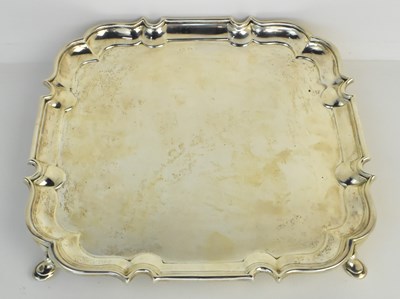 Lot 1124 - A George V hallmarked silver tray with shaped...