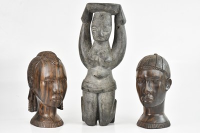 Lot 1359 - A pair of carved hardwood Fulani heads, height...