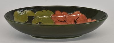 Lot 631 - WILLIAM MOORCROFT; an art pottery oval dish,...