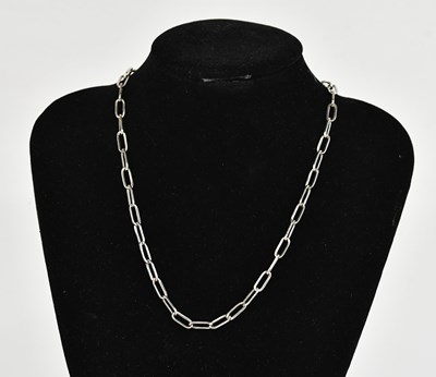 Lot 323 - An Italian white metal trombone link necklace,...