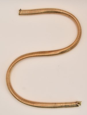 Lot 1422 - A 9ct rose gold coiled and sprung necklace,...