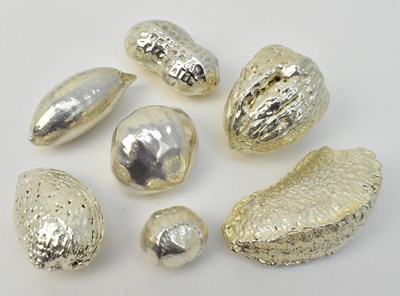 Lot 1180 - Seven unusual hallmarked silver replica nuts...