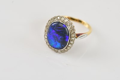 Lot 475 - A yellow and white metal black opal cluster...