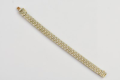 Lot 71 - A 9ct yellow gold diamond set bracelet, set...