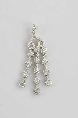 Lot 320 - A white metal diamond set floral cascade...
