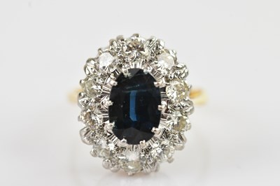 Lot 466 - A yellow and white metal diamond and sapphire...