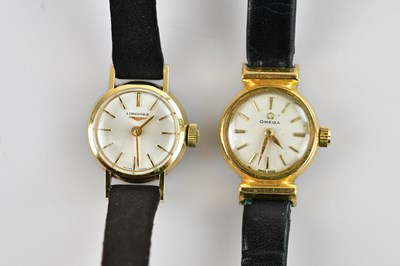 Lot 1113 - LONGINES; a lady's gold plated and stainless...