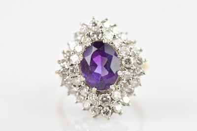 Lot 474 - A yellow metal diamond and amethyst set...