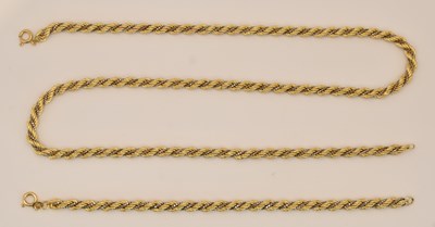Lot 1420 - An 18ct yellow and white gold rope twist...