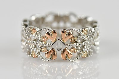 Lot 672 - CLOGAU; a sterling silver dress ring, size J,...