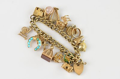 Lot 72 - A 9ct yellow gold curb link bracelet, with...