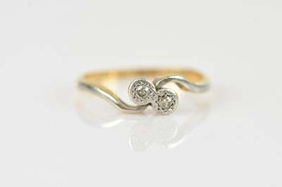 Lot 641 - A yellow and white metal diamond illusion set...