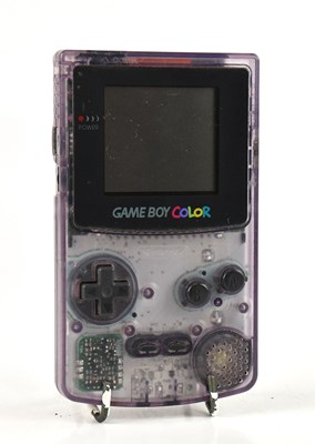Lot 1636 - A Gameboy Color hand held games console in...