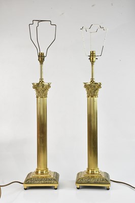 Lot 1330 - A pair of 20th century brass Corinthian column...