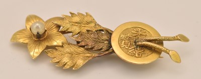 Lot 1505 - A Chinese yellow metal floral spray brooch set...