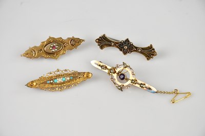 Lot 187 - Two Victorian 15ct gold bar brooches including...