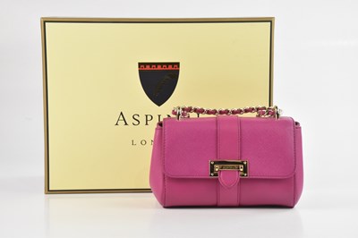 Lot 1450 - ASPINAL; a fuchsia pink textured leather Micro...