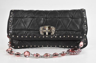 Lot 1451 - MIU MIU; a black soft quilted calfskin crystal...