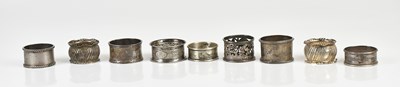 Lot 273 - Nine hallmarked silver napkin rings including...