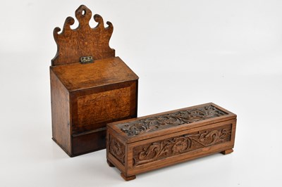 Lot 2194 - An 18th century oak candle box with mahogany...
