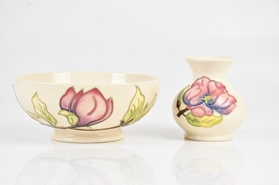 Lot 1580 - MOORCROFT; two pieces in the 'Magnolia' on...