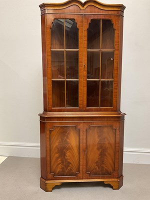 Lot 1065 - A reproduction mahogany corner display...