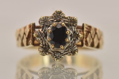 Lot 1267 - A 9ct yellow gold vintage dress ring, the...