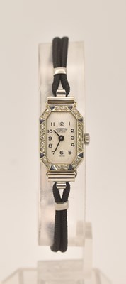 Lot 1680 - AUREOLE; a lady's diamond and sapphire set Art...