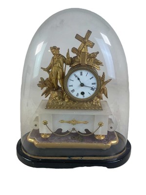 Lot 236 - A brass and marble figural mantel clock with...