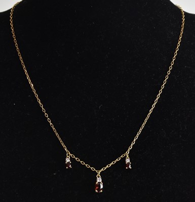 Lot 1442 - An 18ct yellow gold dainty necklace, length...