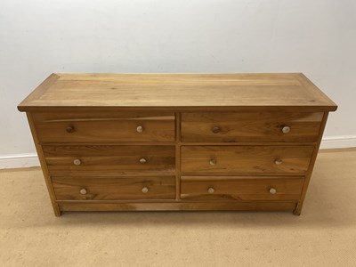 Lot 804 - A modern walnut side table with six drawers,...